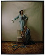 Irving Penn
American, 1917–2009, Dorian Leigh on Chair with Tailor Working on Hem Dorian Leigh on Chair with Tailor Working on Hem