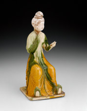 Seated Woman Holding Mirror